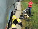 Doy G.'s truck after tire blowout - Talons kept the Camper secured!