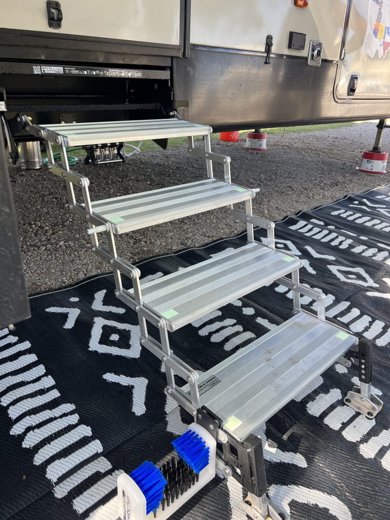 GlowStep Revolution vs. Factory RV Steps: What Changes When Your Steps Reach the Ground?